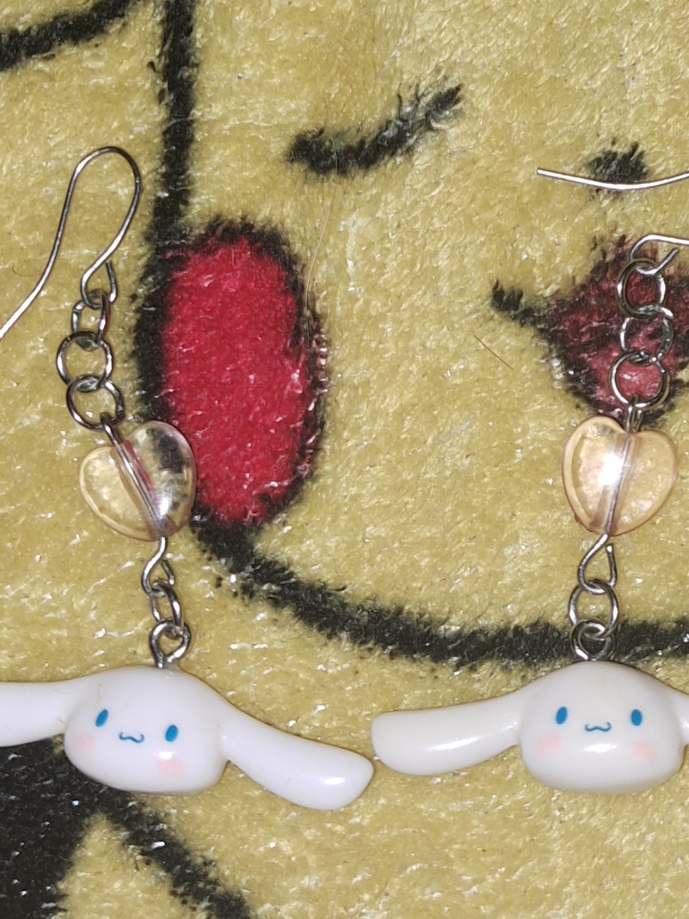 Cinnamoropp Face Dangle Earrings with Pink Heart Accent
